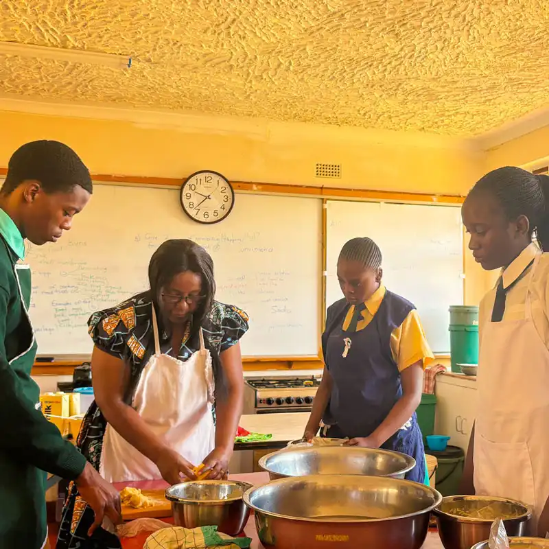 The learners learning about food nutrion and technology in the kitchen.